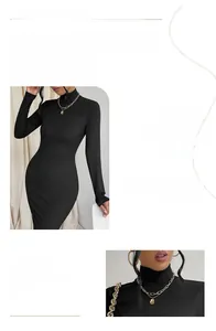Détail d'une robe noire élégante à manches longues montrant le col haut et la texture