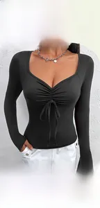 Detail of black slim fit V-neck tee featuring front ruched drawstring and bow tie accent