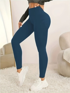 High-waisted seamless navy blue yoga leggings for tummy control and body sculpting
