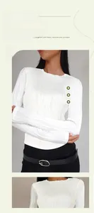 Detail of white ribbed long sleeve tee showing breathable fabric and slim fit design