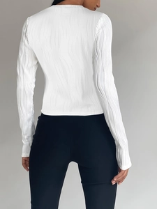 Modern white long sleeve ribbed T-shirt with crew neck and textured vertical pleats