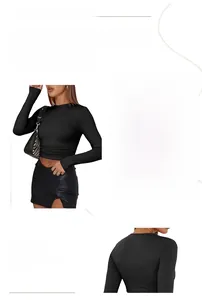 Close-up of black long sleeve milk silk top featuring slim fit tailoring and round neck