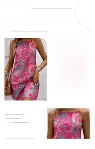 Detail of bohemian halter neck dress with vibrant pink and blue floral patterns