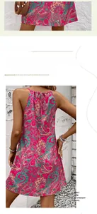 Detail of pink paisley print chiffon mini dress with drawstring back and halter neckline