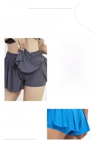 Detail of double-layer yoga skort showing breathable inner shorts and wide elastic waistband
