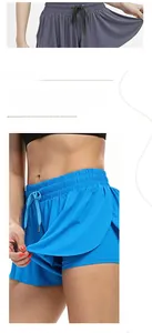 Detail of running skorts with elastic drawstring waist and double-layer mesh fabric
