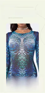 Detailed view of vibrant fish scale print on blue gradient long sleeve mermaid bodysuit