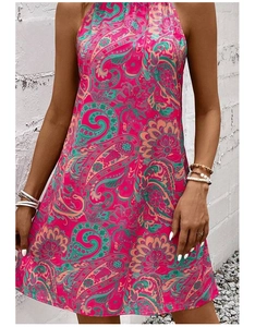 Detail of bohemian paisley print halter neckline on pink sleeveless summer mini dress