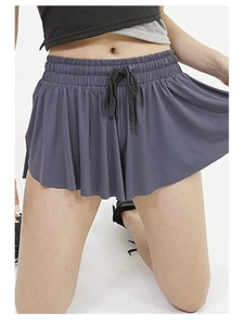 Detail of dark grey breathable running skirt-shorts with elastic drawstring waistband