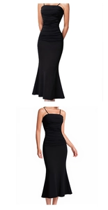 Detail of elegant black slim fit dress featuring ruched bodice and delicate spaghetti straps