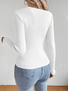 Rear view of white slim fit ribbed knit sweater featuring vertical texture details