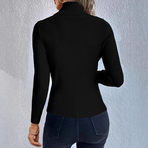 Rear view of a black high-neck rib-knit sweater showing fitted long-sleeve texture