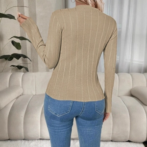 Macro detail of khaki ribbed knit sweater showing high-quality slim-fit texture on back