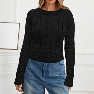 Detailed view of the black cable-knit texture on a women's crew neck sweater