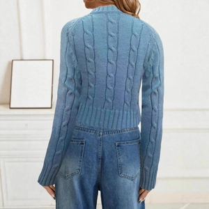 Rear view of a light blue cable knit sweater featuring detailed texture and a slim fit cut