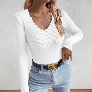 Slim fit white ribbed knit long sleeve sweater for women featuring a wavy V-neckline