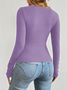 Detailed back view of purple ribbed knit sweater with decorative gold buttons on sleeves