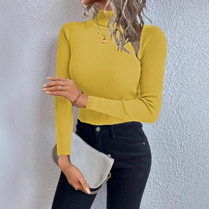Close-up of bright yellow ribbed knit fabric texture on a slim turtleneck sweater