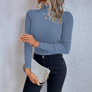 Detailed view of women blue turtleneck knit sweater featuring vertical ribbed texture