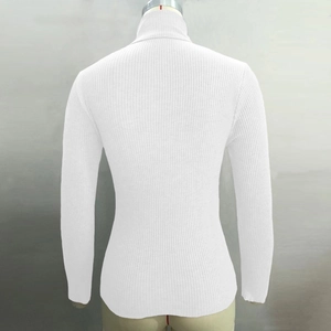 Macro detail of white turtleneck sweater showing tight vertical rib-knit texture on back