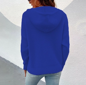 Detail of the hooded knit cardigan back view in royal blue thick vertical knit fabric
