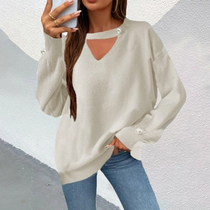 Chic beige knit sweater with a hollow V-neck and pearl buttons on sleeves for women