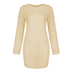 Close-up of beige fuzzy knit texture on long sleeve mini dress with a round neck