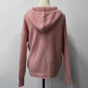 Detailed back view of pink hooded knit cardigan featuring vertical ribbed texture and hood