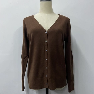 Detailed front view of a brown V-neck knit cardigan sweater with seven light buttons