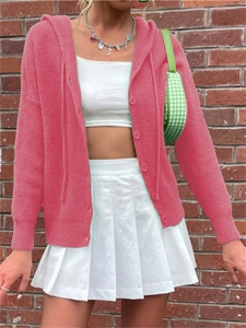 Detail shot of pink hooded knit cardigan with matching buttons and soft texture design