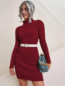 Detail view of burgundy knit maxi dress texture with high neck and white belted waist