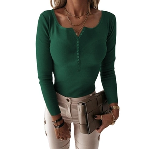 Dark green slim fit ribbed knit sweater with long sleeves and decorative buttoned neckline