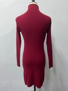 Detailed texture of burgundy ribbed knit long sleeve turtleneck mini dress for autumn