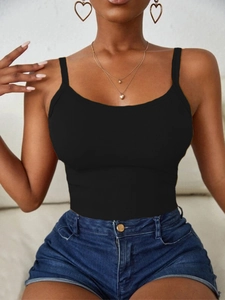 Close-up of black ribbed knit tank top texture and slim-fit cropped sleeveless design
