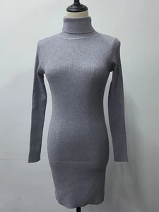 Detail of grey ribbed knit texture and turtleneck collar on long-sleeve midi dress