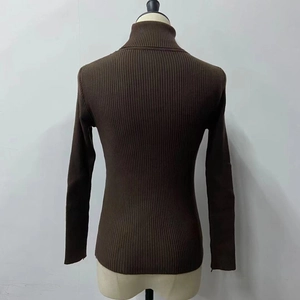 Detailed back view of a slim fit brown ribbed knit turtleneck sweater for women