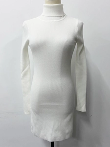 Close-up of white high-neck knit dress featuring vertical ribbed texture and slim-fit design