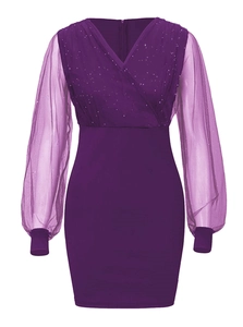 Detail of purple V-neck dress with sheer mesh long sleeves and sparkling sequins