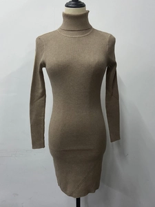 Detail of coffee brown rib-knit texture and fold-over turtleneck on the slim dress