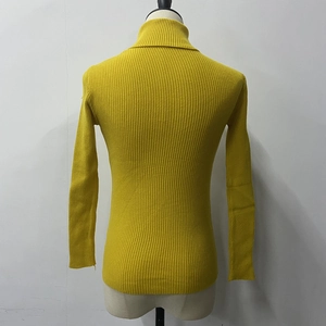 Detail view of the yellow ribbed knit turtleneck sweater with long sleeves and slim fit