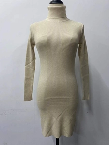 Close-up of cream rib-knit high collar and textured fabric of the bodycon midi dress