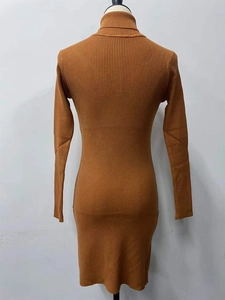 Rear view of caramel ribbed knit turtleneck dress showing slim fit texture and fabric detail