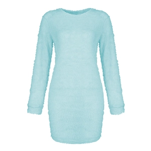 Detail of light blue fuzzy mini dress featuring soft plush fabric and crew neck design