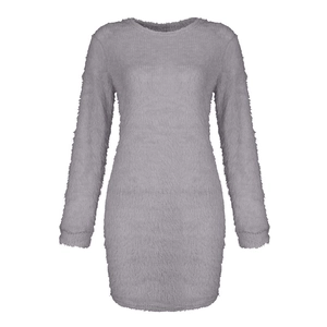 Close-up of gray knitted dress showing the soft fuzzy fabric texture and round neckline