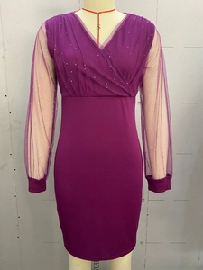 Detail showing the sheer mesh sleeves with silver sequins on a V-neck purple evening dress