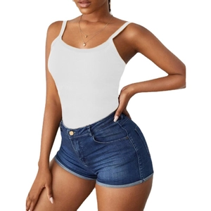 Women summer ribbed tank top in white paired with denim shorts for a casual casual look