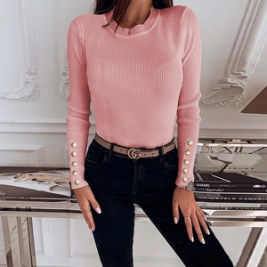 Pink ribbed slim-fit knit sweater for women featuring decorative gold buttons on sleeves
