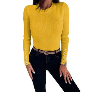 Slim fit ginger yellow knit sweater with vertical stripes and button details on cuffs