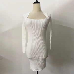 Detail view of white square neck ribbed knit mini dress with long sleeves and soft texture