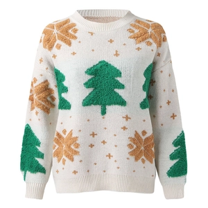 Detail of knit sweater showing textured 3D Christmas tree patterns and ribbed cuffs
